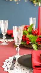 Festive table setting with red, black, and white