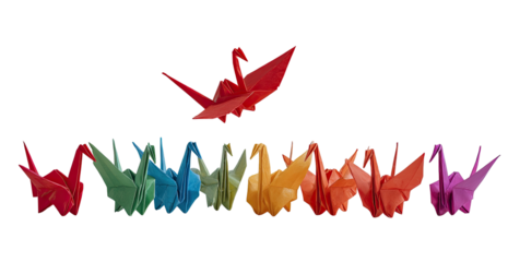 Colorful origami cranes, a vibrant rainbow of paper birds, one red crane soaring above