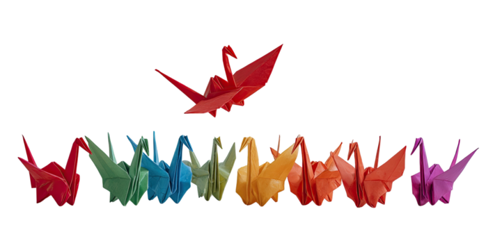 Colorful origami cranes, a vibrant rainbow of paper birds, one red crane soaring above