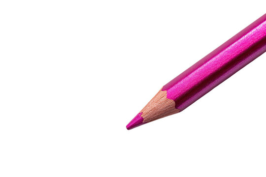 Close-up of a vibrant magenta colored pencil, angled tip foremost against a black background