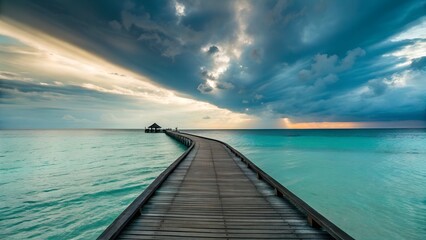 Obraz premium Overwater boardwalk stretching into teal sea, dramatic skies painted with light streaks