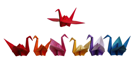 Colorful origami cranes in a spectrum of colors