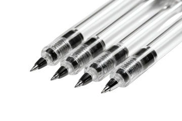 Close-up of four transparent pens, black ink visible inside
