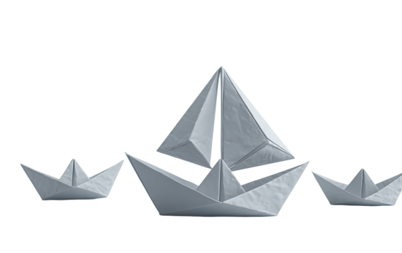 Folded paper ships,  a larger one leading a small fleet