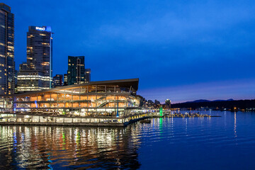 Vancouver, Canada - April 12, 2017: Out and about in the city Vancouver at twilight, with beautifully illuminated buildings and cityscape. 