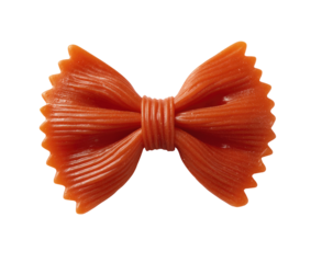 Close-up of a single bow-tie pasta shape, vibrant orange-red hue, against a black background