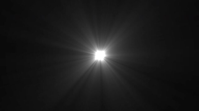 White shining star light. Flickering white glow center optical lens flare. Twinkle star sparkle loop animated on black background. blinking light effect. celebrate, energy concept. 4K loop animation