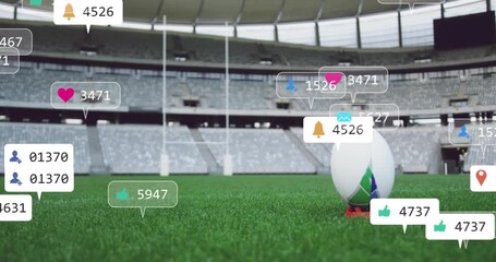 Rugby ball resting on red tee starting floating digital icons signaling growing engagement stats