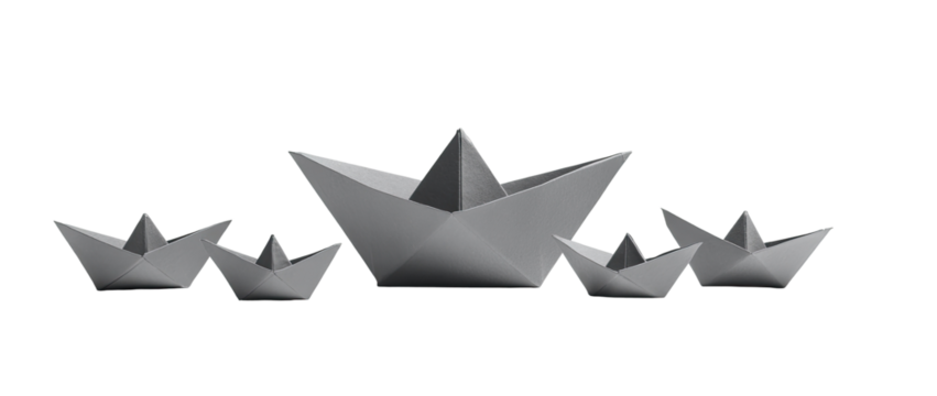 Gray paper origami boats in a group - Powered by Adobe
