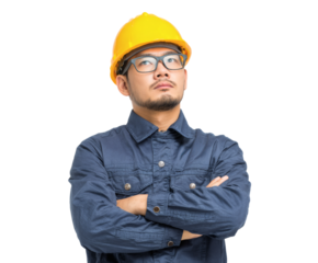 Thoughtful Asian construction worker with arms crossed, looking up.