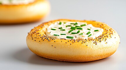 Savory cream cheese filled bagel bites topped with fresh chives