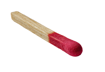 Close-up of a single matchstick, light beige/tan colored wood shaft, vibrant red head