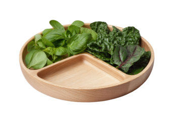 Wooden divided plate holding fresh basil and greens