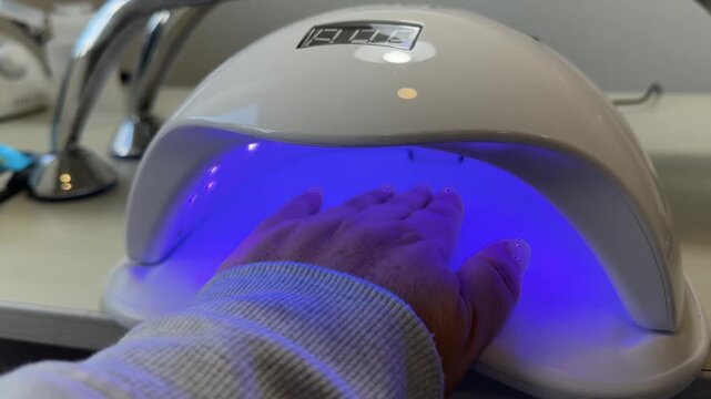 Nail acetone removal stock video footage of manicurist applying based primer dehydrator bond to manicured nails to help promote adhesion. Doing professional beautiful naildesign at beauty studio