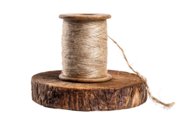 Handmade twine on wooden base crafting supplies studio setting