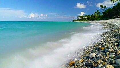 Coastal scene with turquoise water and pebble beach