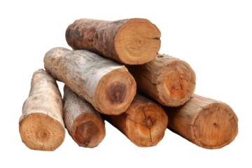 Wood logs stacked neatly in natural setting close-up view