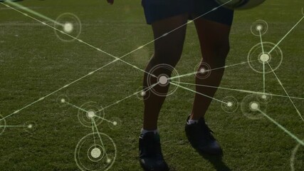 Soccer player tapping ball and initiating network overlay, enhancing realtime ball control training - Powered by Adobe