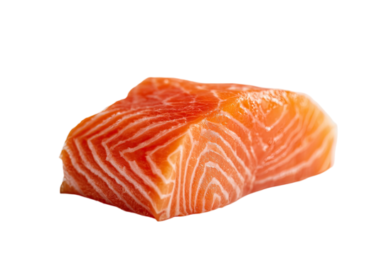 Close-up of a raw salmon fillet piece, showcasing its vibrant orange-pink color and distinct, parallel lines
