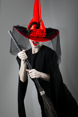 Portrait of surprised woman in halloween costume. Halloween photo. Holidays. Costume. Party. Background. Night. 