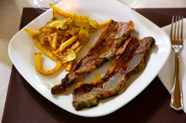 Traditional Spanish dish is Churasco, made from roast beef. Served with French fries and zucchini