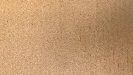 Brown cardboard sheet with texture background. Abstract background of brown cardboard sheet. Cardboard with copy space for text, space for copy.