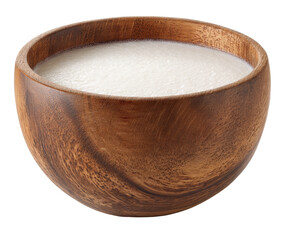 Creamy liquid in a wooden bowl