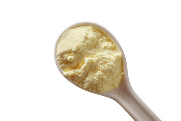 Pale yellow powder fills a small spoon