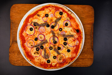 pizza on a wooden table
