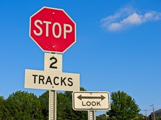 Railroad  crossing stop sign with warning to &lsquo;Look&rsquo;