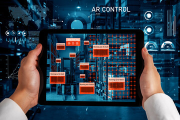 Smart warehouse management system using augmented reality technology to identify package picking and delivery . Future concept of supply chain and logistic business .