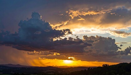 Dramatic sunset panorama with storm clouds