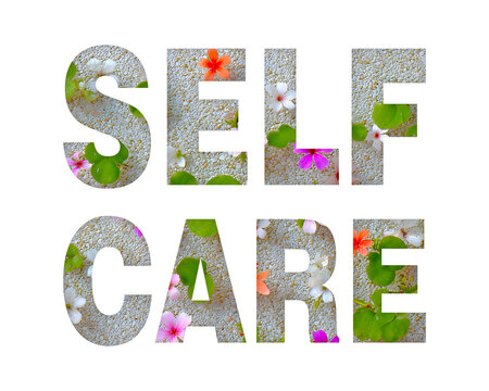Self care text effect with flowers and pebbles design