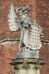 Fototapeta premium Hampton Court palace gargoyles. These decorative figures, often resemble protective beasts. They can be found on the courtyard of this medieval palace. 
