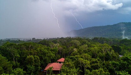 Storm over lush rainforest