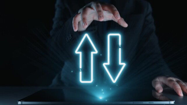 A striking image showcasing a hand reaching out to interactive arrows representing quality and cost dynamics on a digital surface, highlighting business analysis and decision-making. Qubit