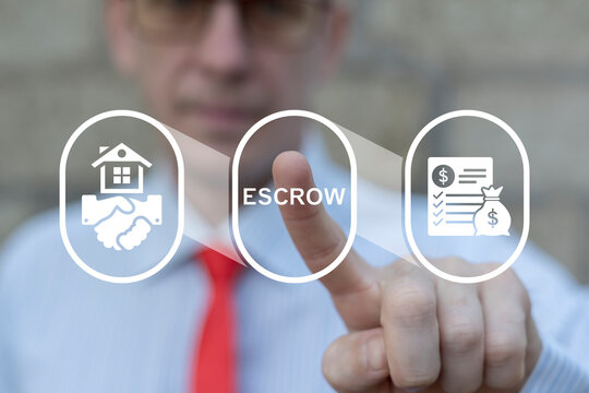 Business person using virtual touch screen presses the word ESCROW. Concept of in escrow agreement. Escrow Account Business Deal. - Powered by Adobe