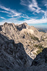 Scenic View Of Zugspitze And Jubilee Ridge From Via Ferrata Alpspitze: Rugged Rocky Peaks Of The Bavarian Alps Under Clear Blue Sky