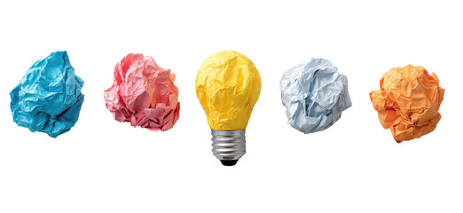 Crumpled paper balls and a lightbulb
