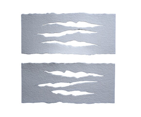 Two rectangular pieces of white paper, each with three parallel, jagged tear/hole patterns