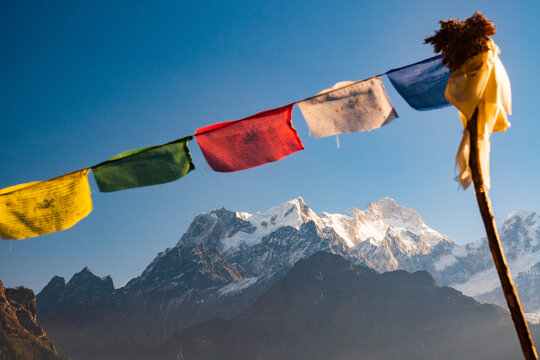 Prayer flags over Manaslu Peak