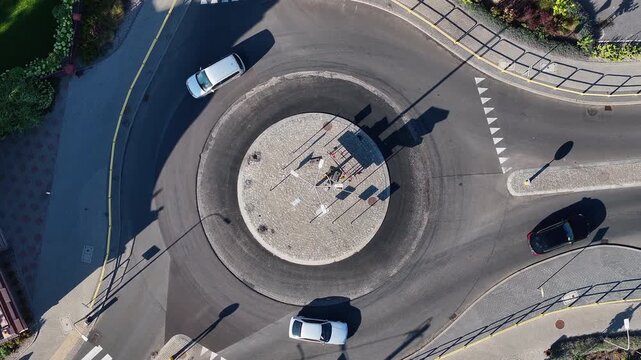 Aerial Strzelno Poland round about traffic fast. Central north Poland. German occupation World War II. Farm rural area. Historical trade and religious center. Historic buildings rural village.
