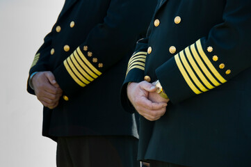 Detail image of police officer dress uniforms at a memorial event.