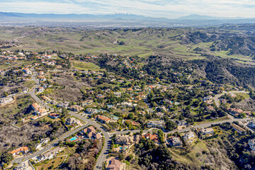 Diamond Bar, Los Angeles County, CA, California, January 26, 2024: Aerial Drone View toward Country Park, Indian Creek Rd, Loma Linda with Mountain Village, Homes, Houses, Streets
