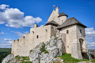 Rebuilt medieval castle on limestone rocks in the village of Bobolice