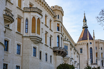 Obraz premium Majestic european castle architecture with towers and gothic windows