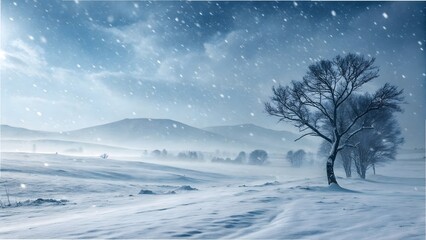 Lone bare tree silhouetted against a hazy winter landscape with heavy snowfall and rolling hills Keywords: winter, snow, snowfall, storm, weather, landscape, nature, tree, bare