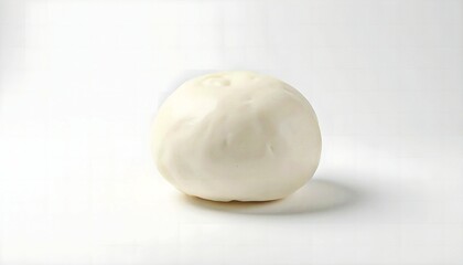 Fototapeta premium Minimalist White Background of Whole Mozzarella Ball in Bright Studio Lighting for Product Packaging