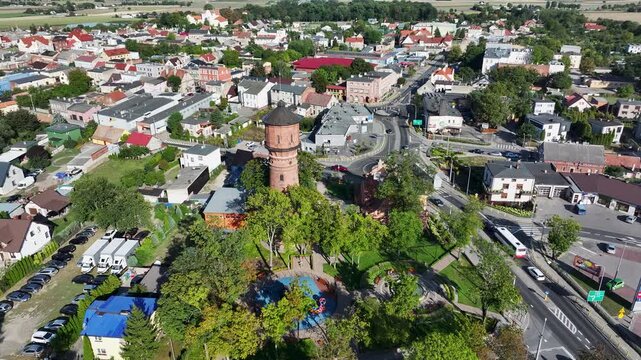 Aerial Strzelno Poland historic water tower circle. Central north Poland. German occupation World War II. Farm rural area. Historical trade and religious center. Historic buildings rural village.