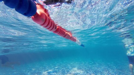 Swimming pool lane floating in underwater perspective